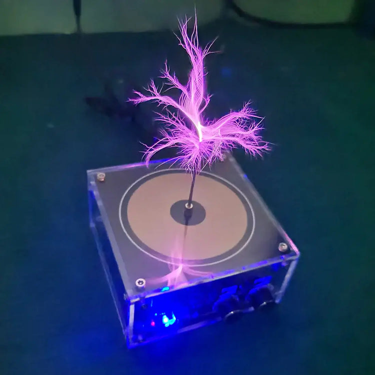 Bluetooth Tesla Coil displaying 10cm lightning and music visualization on a clear platform