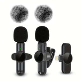 Wireless Lavalier Microphone set with furry windshields for crystal-clear audio on mobile devices.