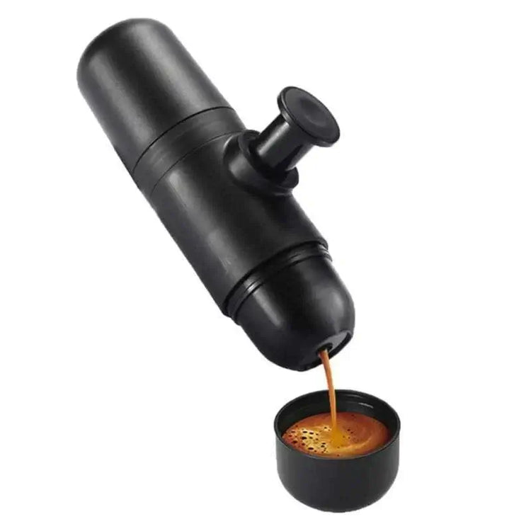 Portable Manual Espresso Maker extracting rich espresso into cup