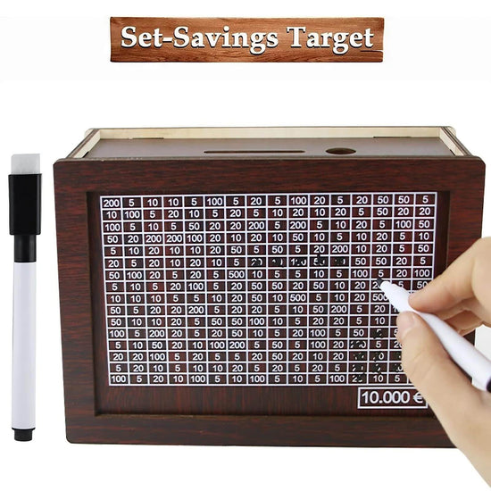Money Saving Challenge Box with a hand marking savings goal, wooden design, includes a marker and savings chart.
