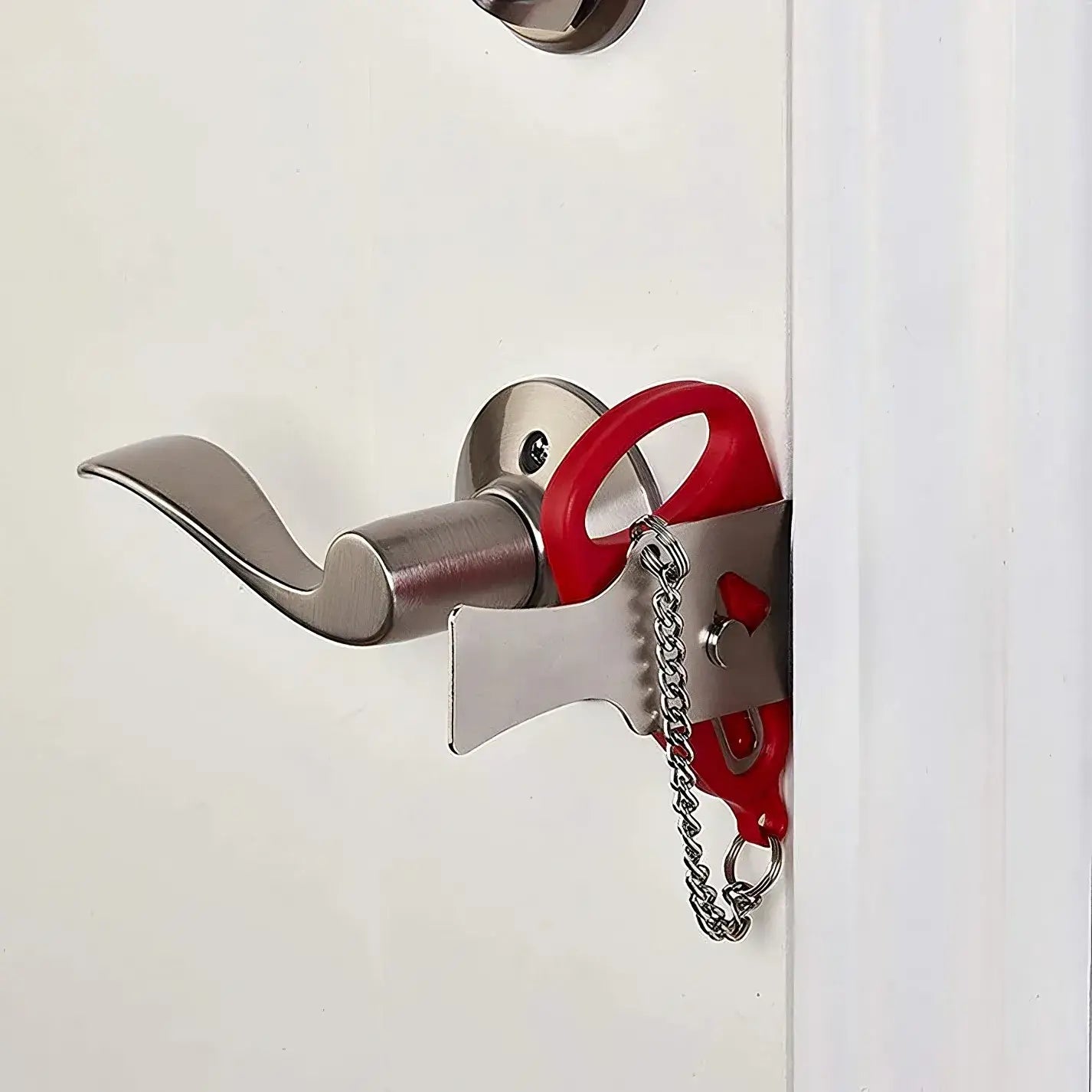 Smart Portable Door Guard installed on a door handle, providing extra security and peace of mind.