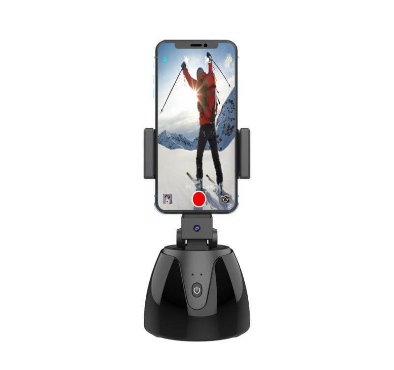 Auto-Tracking Phone Holder capturing skiing action with 360° motion tracking