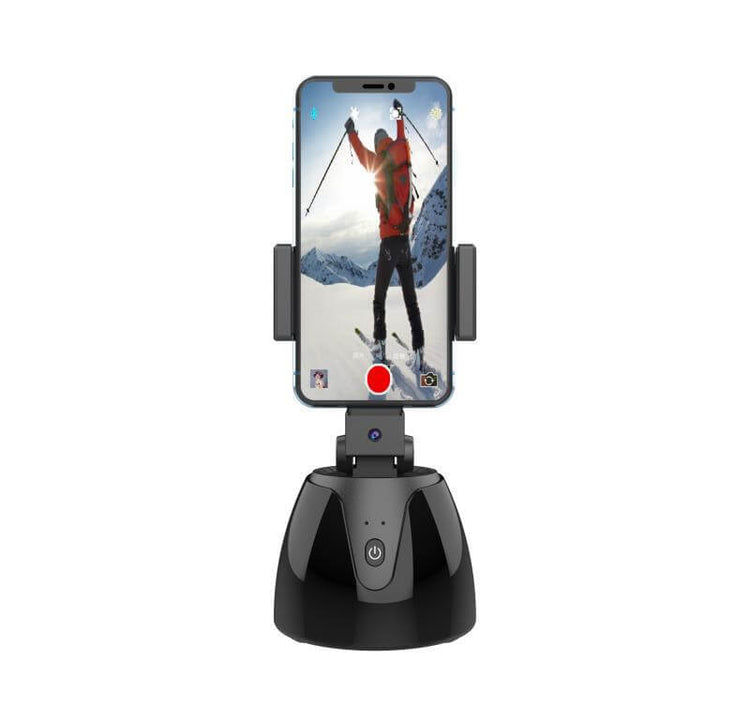 Auto-Tracking Phone Holder capturing skiing action with 360° motion tracking