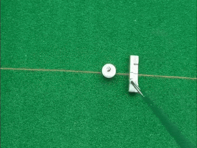 Golf Laser Putting Trainer showing precise alignment line on green surface