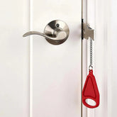 Smart Portable Door Guard attached to a door handle for enhanced security and peace of mind.