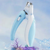 Pet Nail Clipper with LED Light for easy and safe grooming, shown against a decorative background