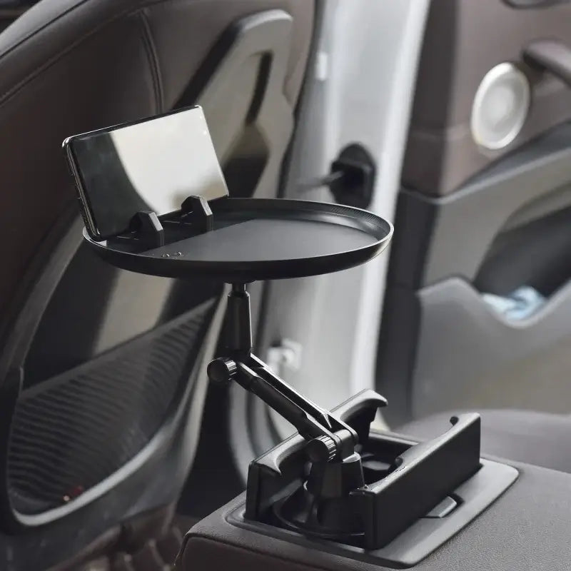 Car Swivel Tray, turn your cup holder into a mini table, perfect for mobile devices and snacks on the go.