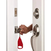 Smart Portable Door Guard in use, providing added security to a door with a person installing it.