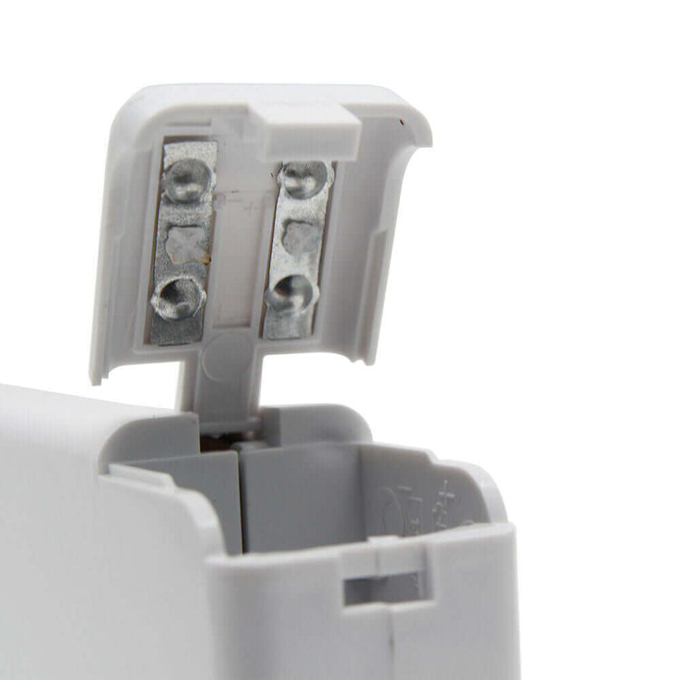 Close-up of a Handheld Sewing Machine&