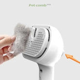 Pet Steam Brush removing collected pet hair and fur for effective grooming and de-shedding.