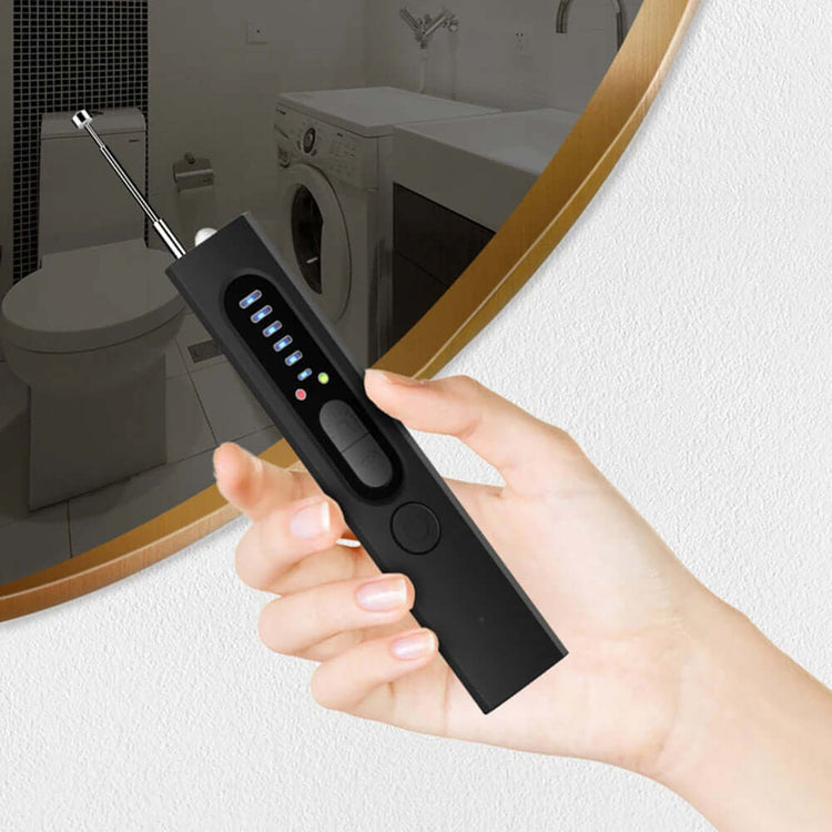 Hidden Camera & Bug Detector being held in hand, featuring user-friendly interface and compact design for privacy protection.