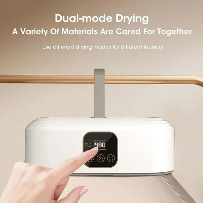 Electric Travel Clothes Dryer displaying dual-mode drying options for various materials and laundry types.